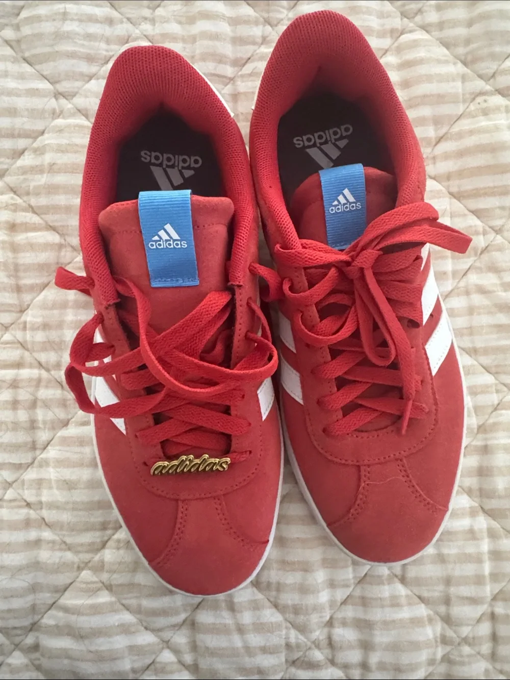 adidas Red Suede Sneakers with White Stripes and Blue Tongue Tag
